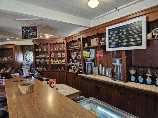 Counter seating and a few tables to the left.