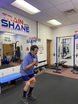 My 83 year old client Karl doing resistance band lateral steps to strengthen his hip flexors. I've been working with him for over 8 years.