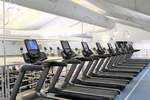 Cardio deck overlooking fitness floor