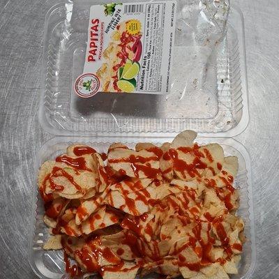 Papa caseras con Chile 
homemade potato chips with chile