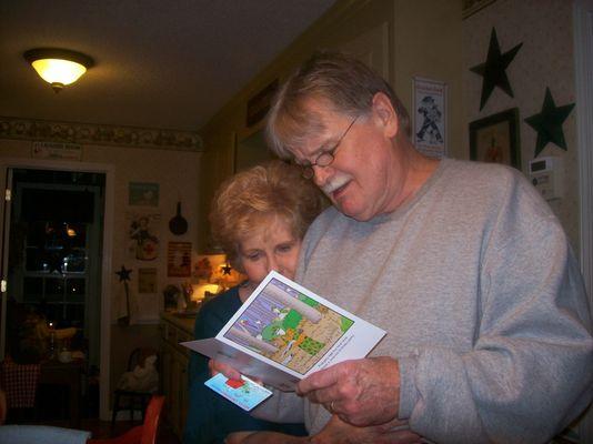 tommy reading birthday caed.