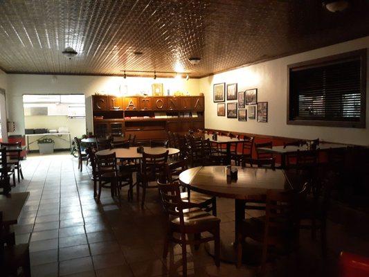 Back dining room with vintage Clatonia memorabilia.   Lights are off which is why its dark
