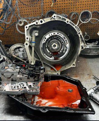 Transmission fluid drained for maintenance--dark or burnt fluid indicates it's time for service or potential internal damage