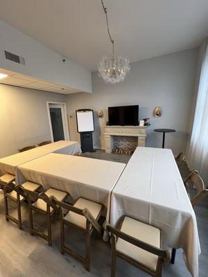 Seating for up to 10 people, with a 50 inch TV