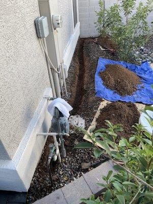 A lot of care taken to dig the trench for the water line.