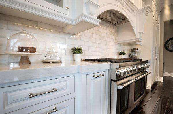 A classic traditional feel with modern cleanliness and functionality, mixed with a Victorian molding and door package.