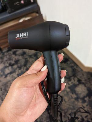 This hairdryer in the room was small but mighty.