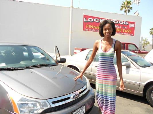 Mrs. Marquetti modeling with her new 2011 Ford Focus.... Check out our inventory online at www.lockwoodautosales.co