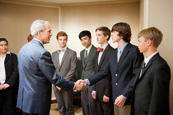 President Bush congratulates the Woodrow team after winning the Bush Institute/St.Mark's Debates.