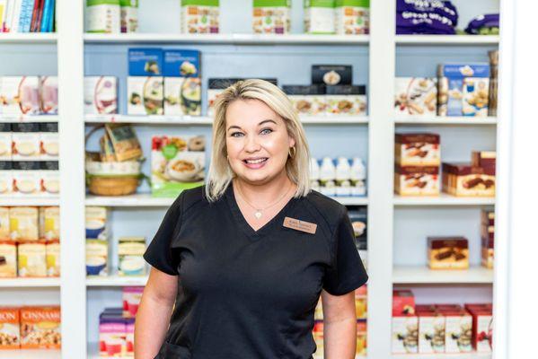 Kate showing the various meal replacement choices we carry.