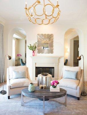 White on white, gorgeous living room w/ gold chandelier. Invite your friends over. Contact us to make it happen! http://www.loridennis.com