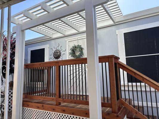 Front porch deck and pergola.