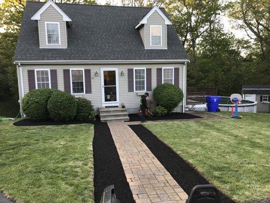 After mulch installation and hedges trimmed.