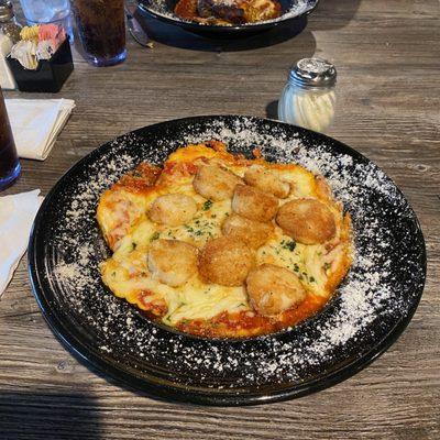 Cheese Ravioli with added seared scallops. The bowls are deeper than the pic shows, with all the raviolis beneath.