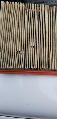 Holes in air flow filter that sits directly on top. Had they did a basic inspection they would of seen it