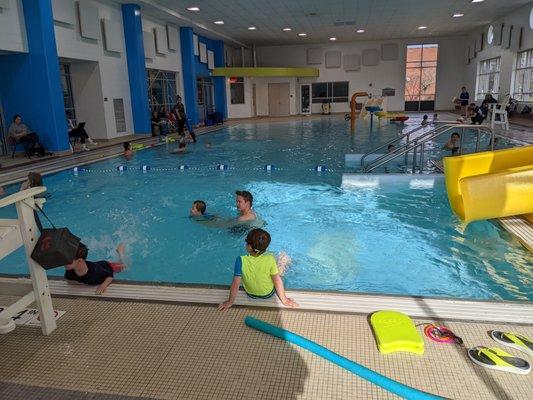 Kid pool with large slide and water area in the back. Goes up to ~3.5" high.