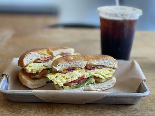 Avacado cheddar bagel, add bacon. Decaf iced americano.