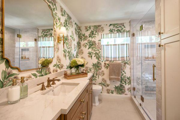 Two La Verne bathrooms reimagined with calming colors, natural textures, and timeless design--tailored for ease, beauty, and flow.