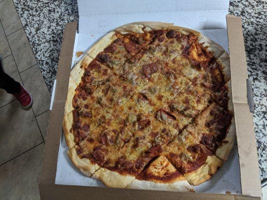 Extra large thin crust sausage and pepperoni.