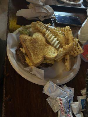Patty melt with a side of waffle fries