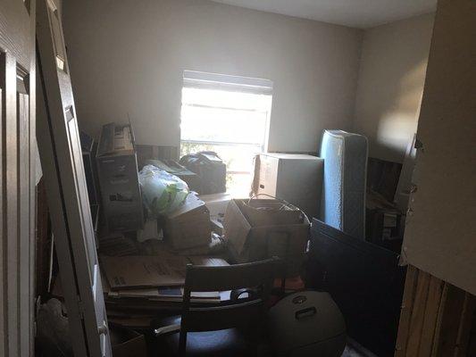 They piled my stuff up in a room uncovered and ripped out the walls and ceiling