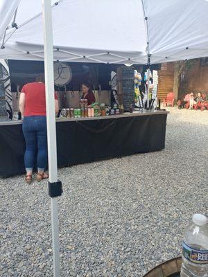 One of the bars (take out cans lined up along the front)