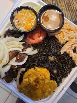 Griot complete; lots of bones and dried out meat for $34 dollar plate! Rice was ok, but bland in flavor. Best part tostones and pasta salad.