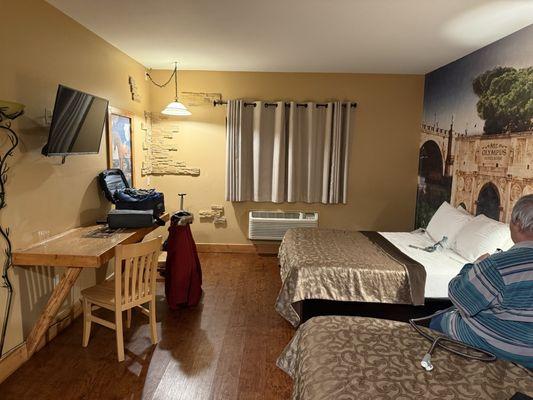 Bench for suitcases and two awful chairs. And two very uncomfortable beds.