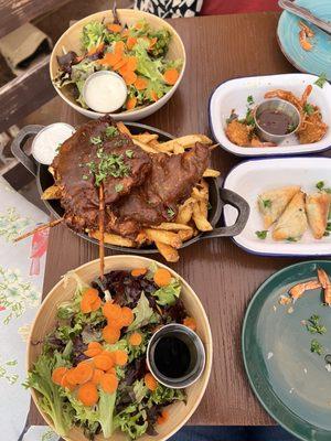 Fish and chips Side salad Coconut shrimp Spanakopita