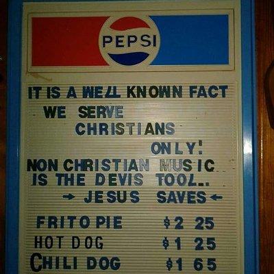 A sign that was hanging in the office and ice cream shoppe