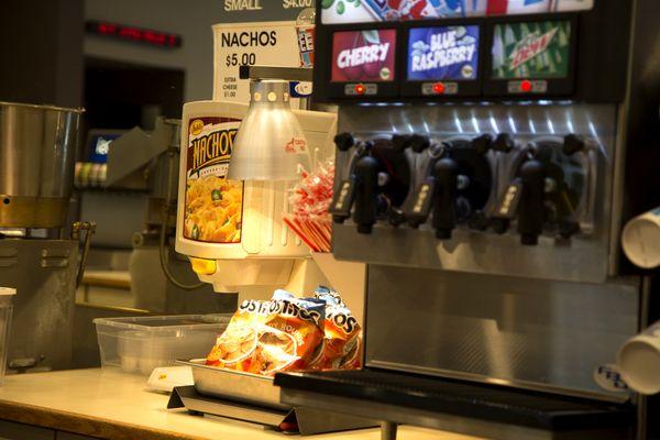 The State 5 offers a variety of snack and candy, including nachos and freshly popped popcorn!