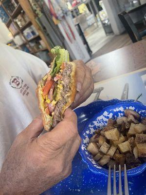 Cheeseburger w/ breakfast potatoes