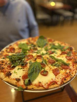 Marghertia pizza with pepperoni and garlic