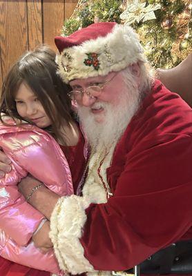 My daughter and Elks Club Santa. Beautiful memory with amazing staff!
