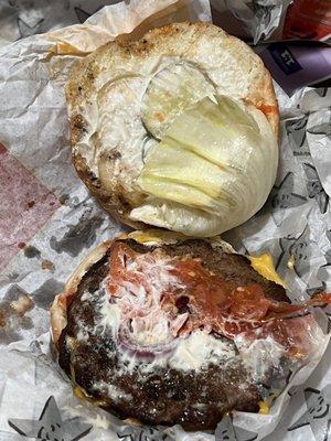 This is probably where am the mayo that was suppose to be in the other burgers ended up... and again.. Lol at that tomato.