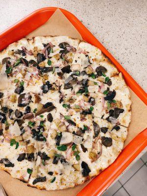 The forestière pizza, mushrooms, potatoes, onions, fresh oregano.