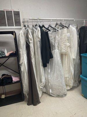 They have wedding dresses here! Brand new... Linens, and Books as well as artwork