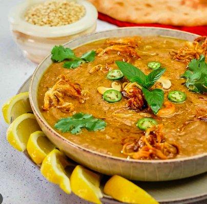 Haleem - Delicious and nutritious.This is our chefs signature dish. It is made of mutton and 8 different pulses slow cooked for long hours.
