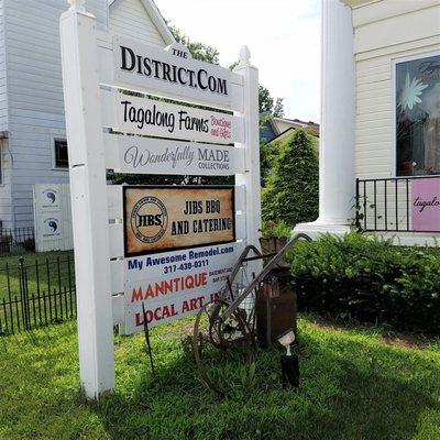 Sign for multiple shops and vendors within the shop (and some nearby)