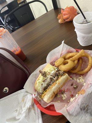 I got the Philly cheesesteak all the way with onion rings and a Coke :) sooo tasty