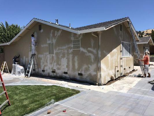 Prepping for paint (we make sure to cover cracks)!