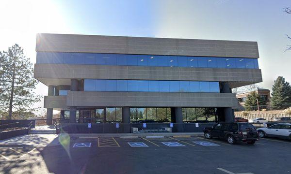 Main building entrance. Ramp is on the left.