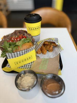 Steak sandwich and truffle has brown potatoes !