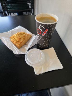 Large Americano and Toasted Coconut Scone. Delicious!