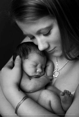 Christopher Lee captured this special moment between my newborn and I that shows how much I love and cherish this gift from God