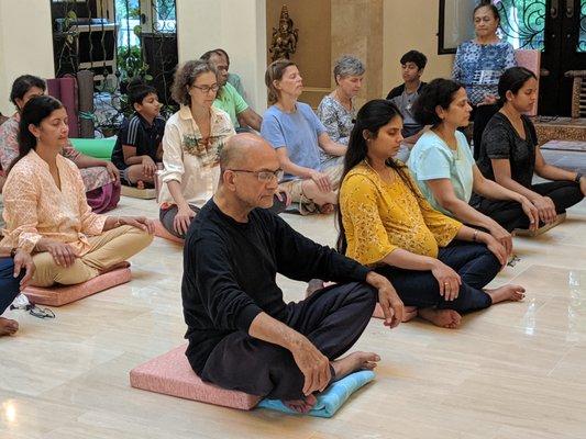 Attendees at one of our special events - a guided deep breathing class for relaxation and rejuvenation.