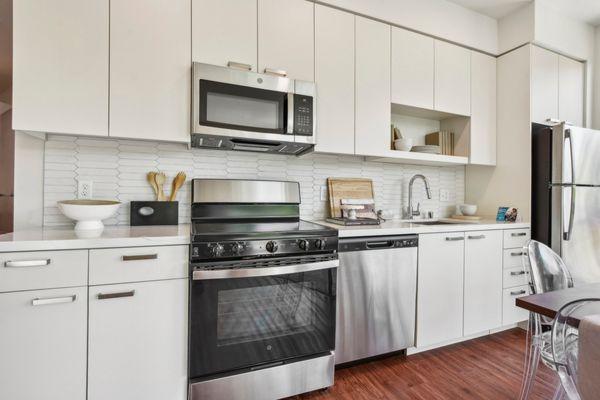 Full kitchen with stainless steel appliances