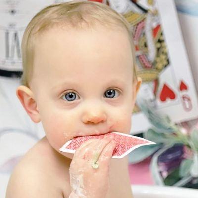 This little was enjoying the clean up part of her smash cake session. As you can see, she still loved her cards .