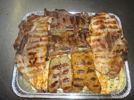 Whole Parrillada (chicken breast, pork chops, beef ribs & Italian sausages hot/sweet)