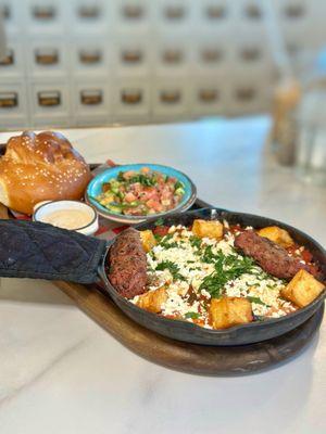 Mediterranean Shakshuka w/ added sinia and halumi